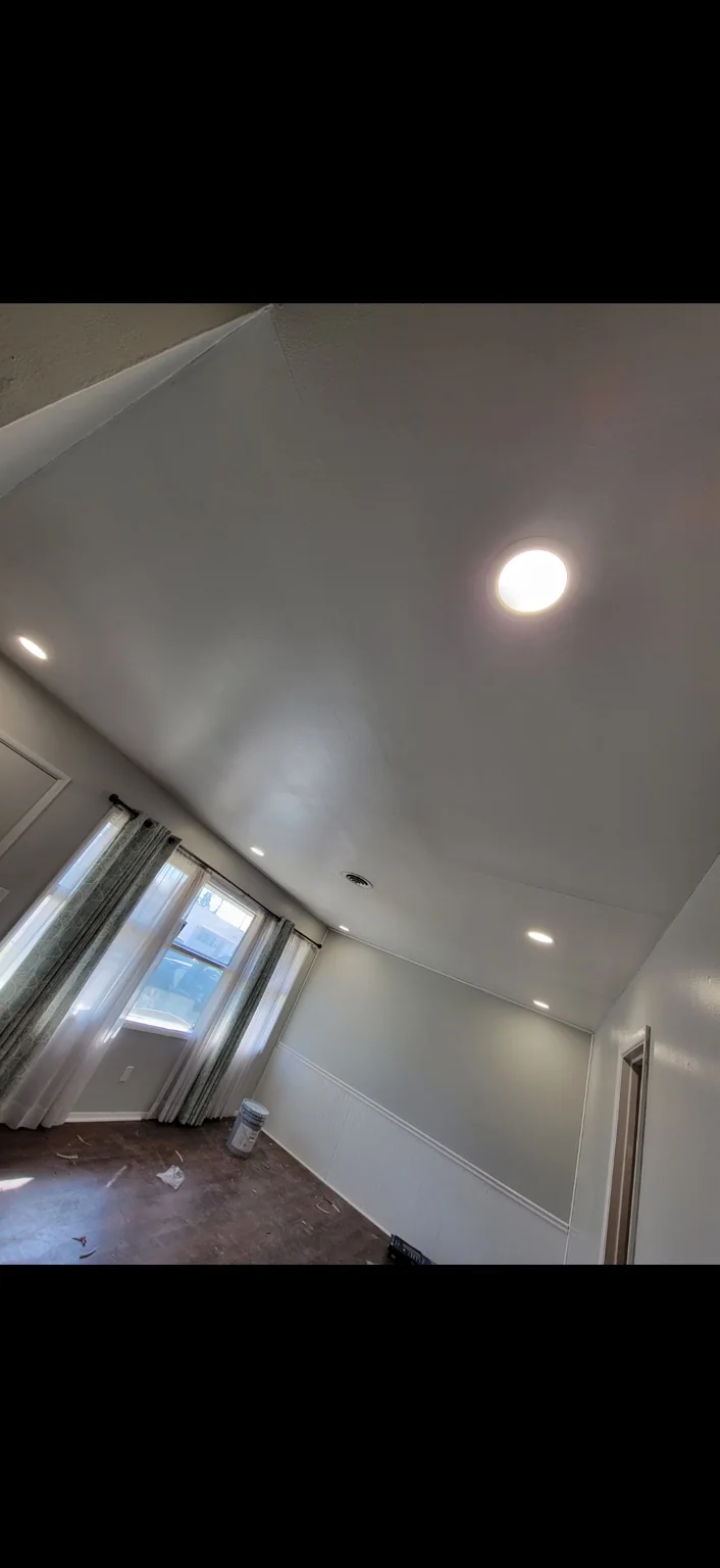 Room lighting upgrade. Recessed lighting photographed during a room renovation.
