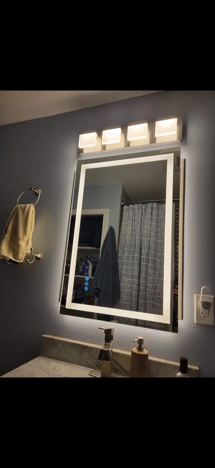 Vanity & mirror lighting. Illuminated mirror and overhead vanity fixtures.