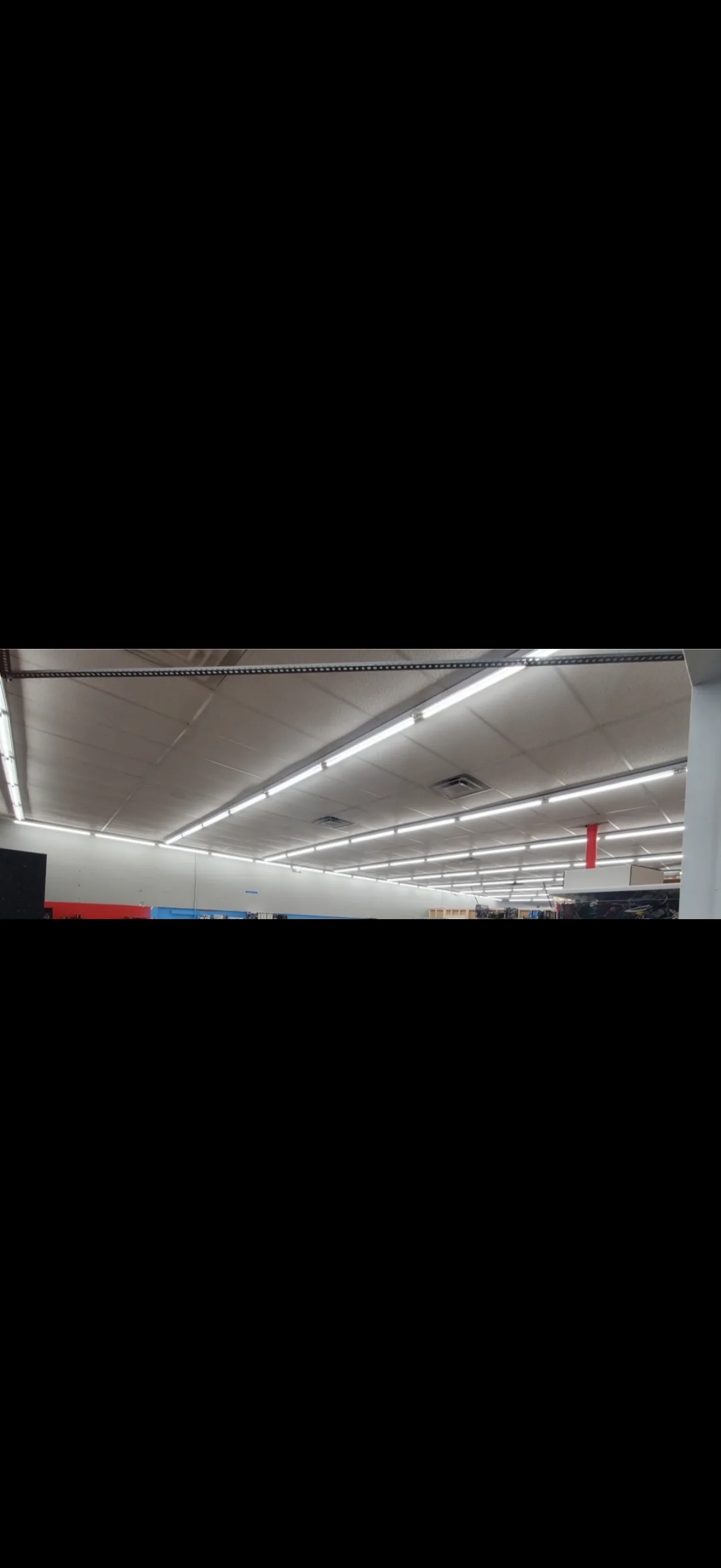Retail lighting detail. A closer view of the overhead lighting layout.