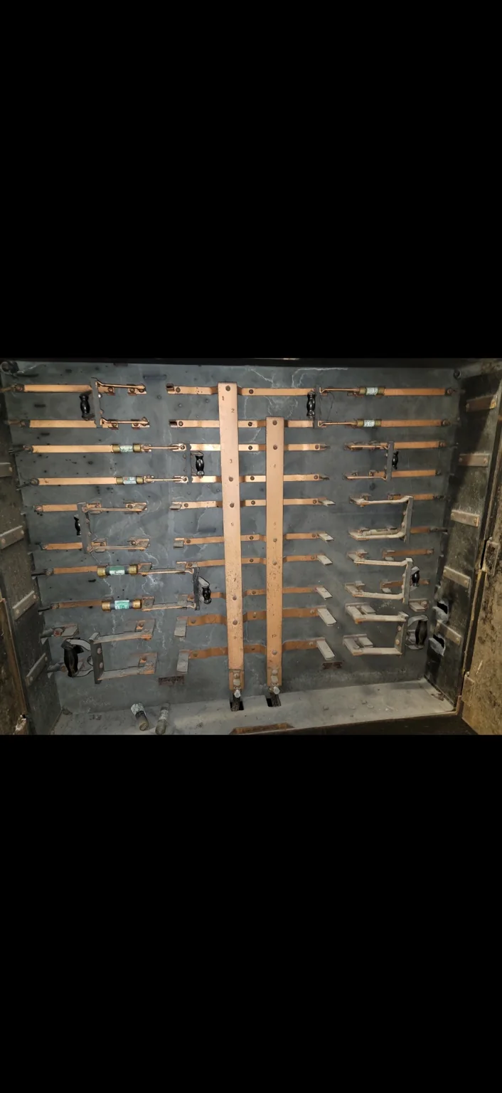 Existing fuse equipment. An older fuse assembly documented before electrical work.