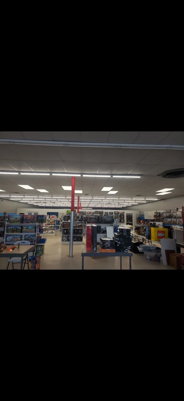 Retail-space lighting. A wider view of lighting across a retail sales floor.