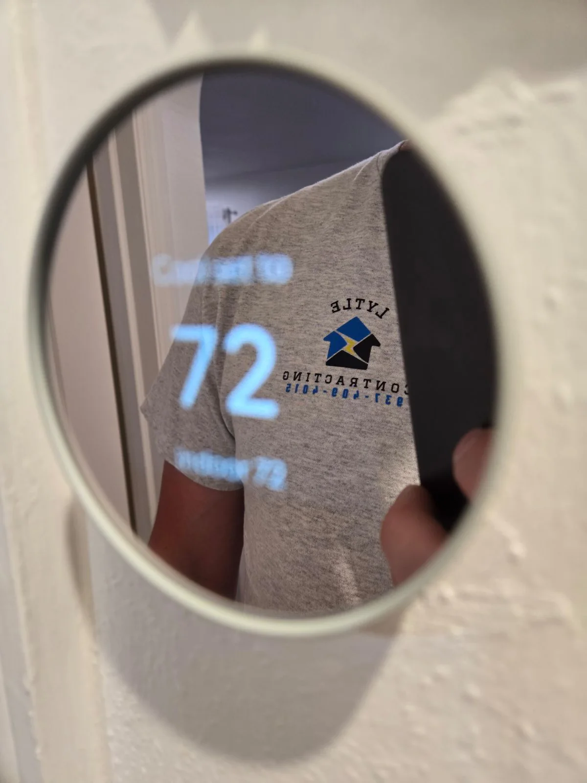Smart thermostat detail. A thermostat photographed on a Lytle project.