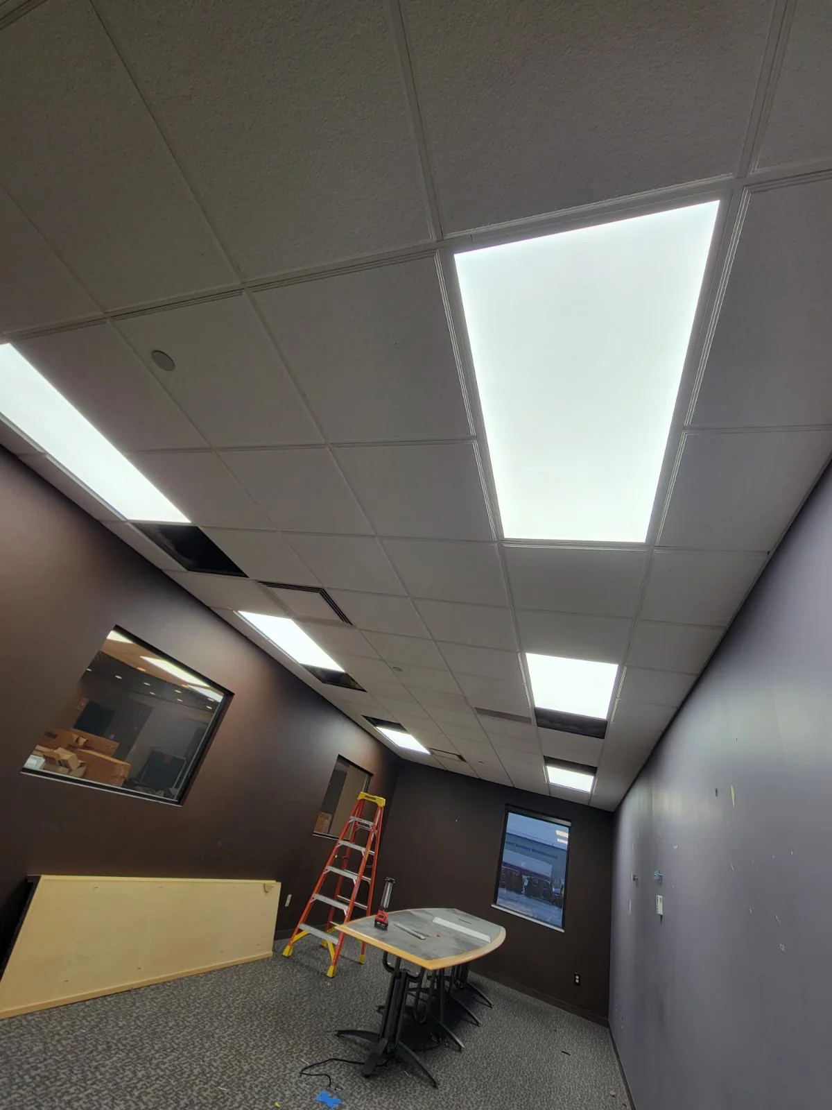 Ceiling lighting installation. Ceiling fixtures photographed during a commercial project.